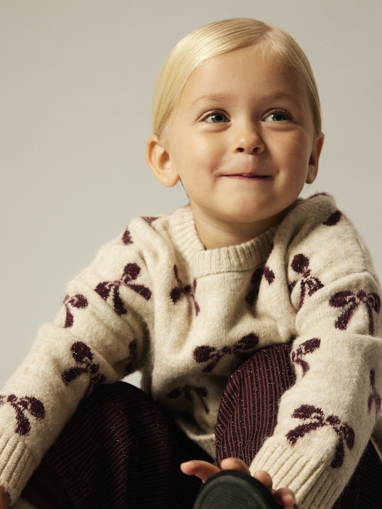 Stickad Rosett Tröja