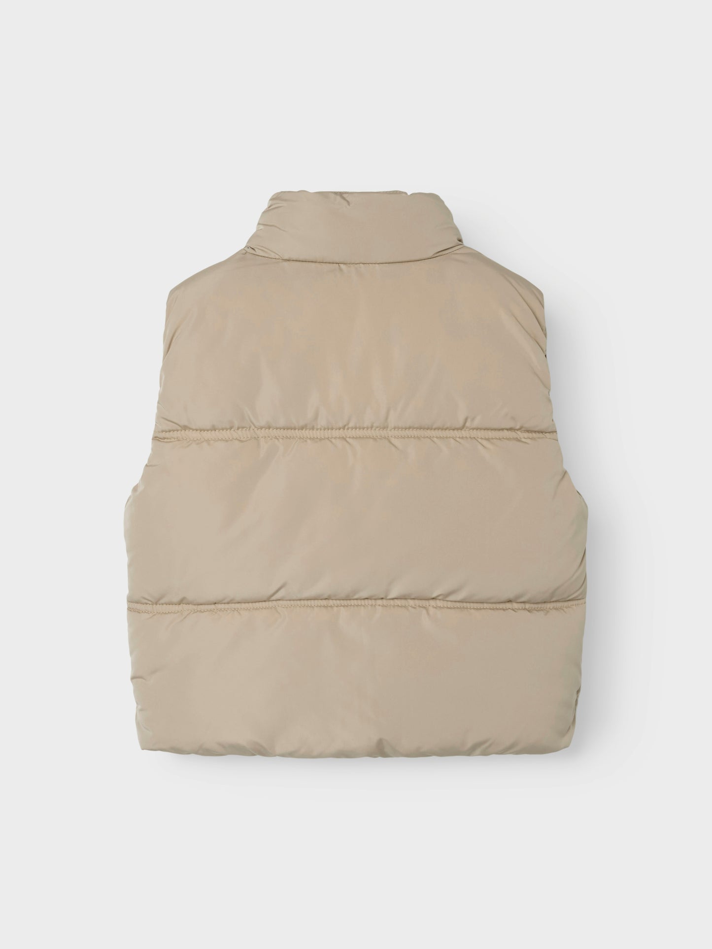 Snygg beige väst till tjej. Täckväst till flicka i återvunnen polyester från Name it.
NKFMAKET VEST NOOS
13237547