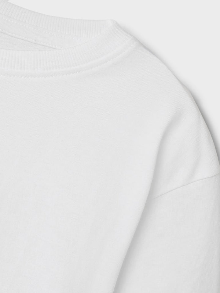Krit vit t-shirt till kille från Name it. Kortärmad tröja till pojke i vitt, loose fit.
NKMVOBBO SS NREG TOP NOOS
13238968