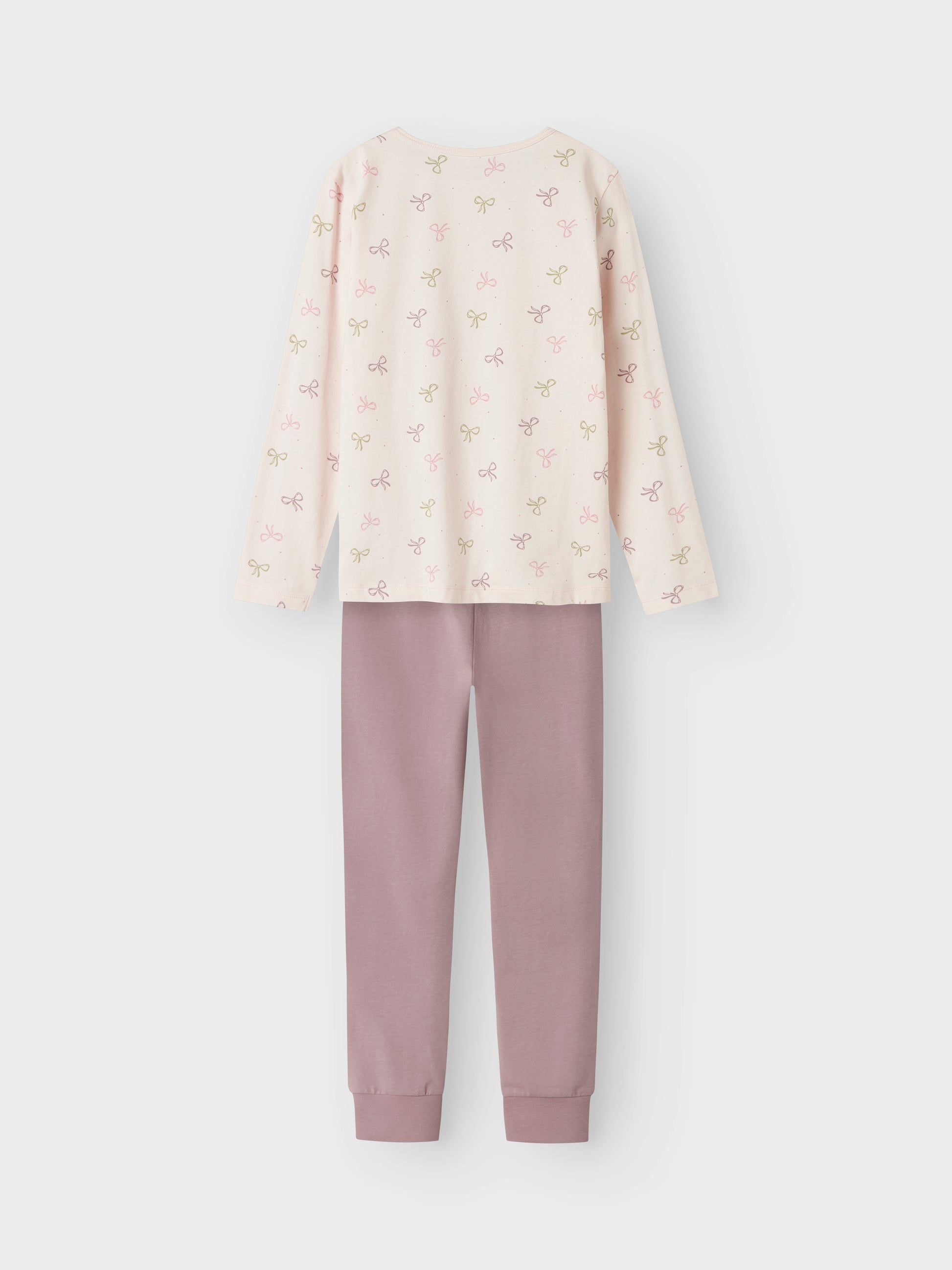 Fin rosa 2-delad pyjamas till flicka. Tjej pyjamas med ljusrosa tröja med mönster av rosetter och lite mörkare rosa pyjamasbyxor.
NKFNIGHTSET BARELY PINK BOW NOOS
13241982