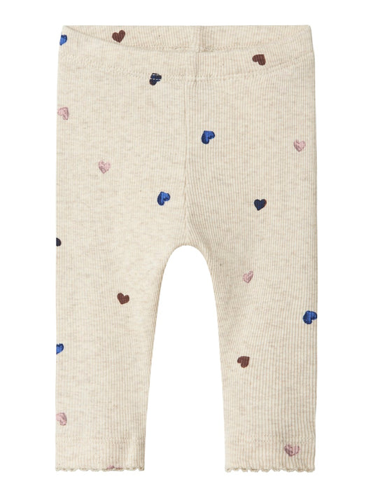Beige baby byxa i ekologisk bomull till liten flicka. Bebis leggings med hjärtan till din nyfödda.
NBFNUTTI LEGGING NOOS
13246492