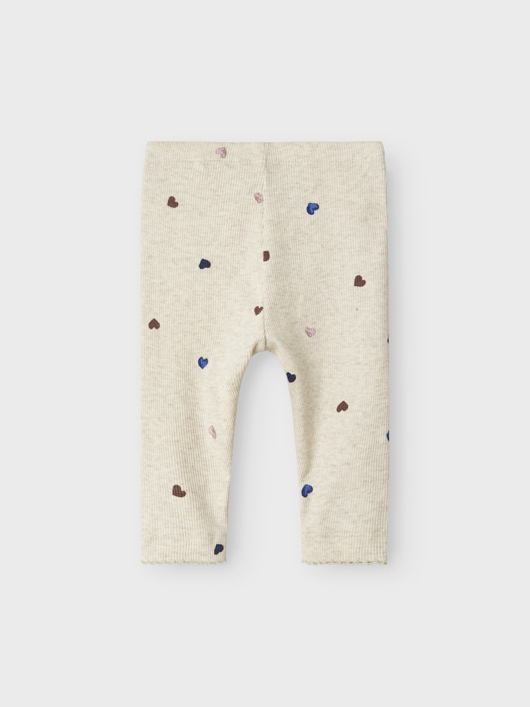 Beige baby byxa i ekologisk bomull till liten flicka. Bebis leggings med hjärtan till din nyfödda.
NBFNUTTI LEGGING NOOS
13246492