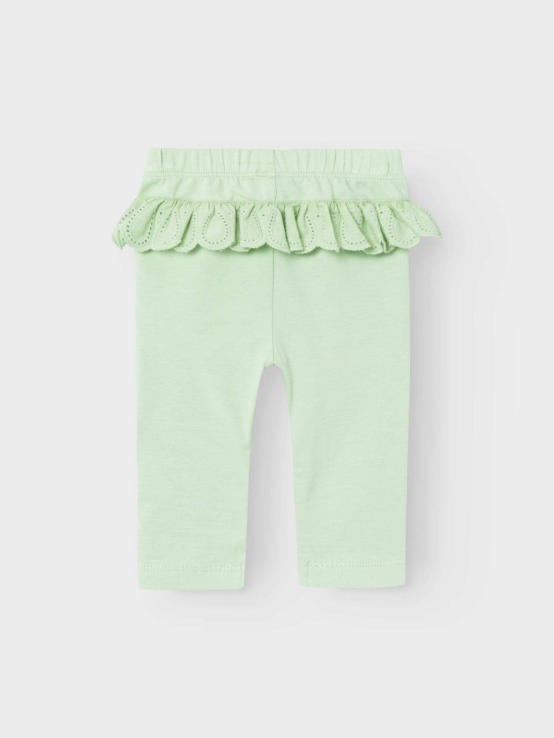 Söt baby byxa i leggings modell med spets på rumpan.