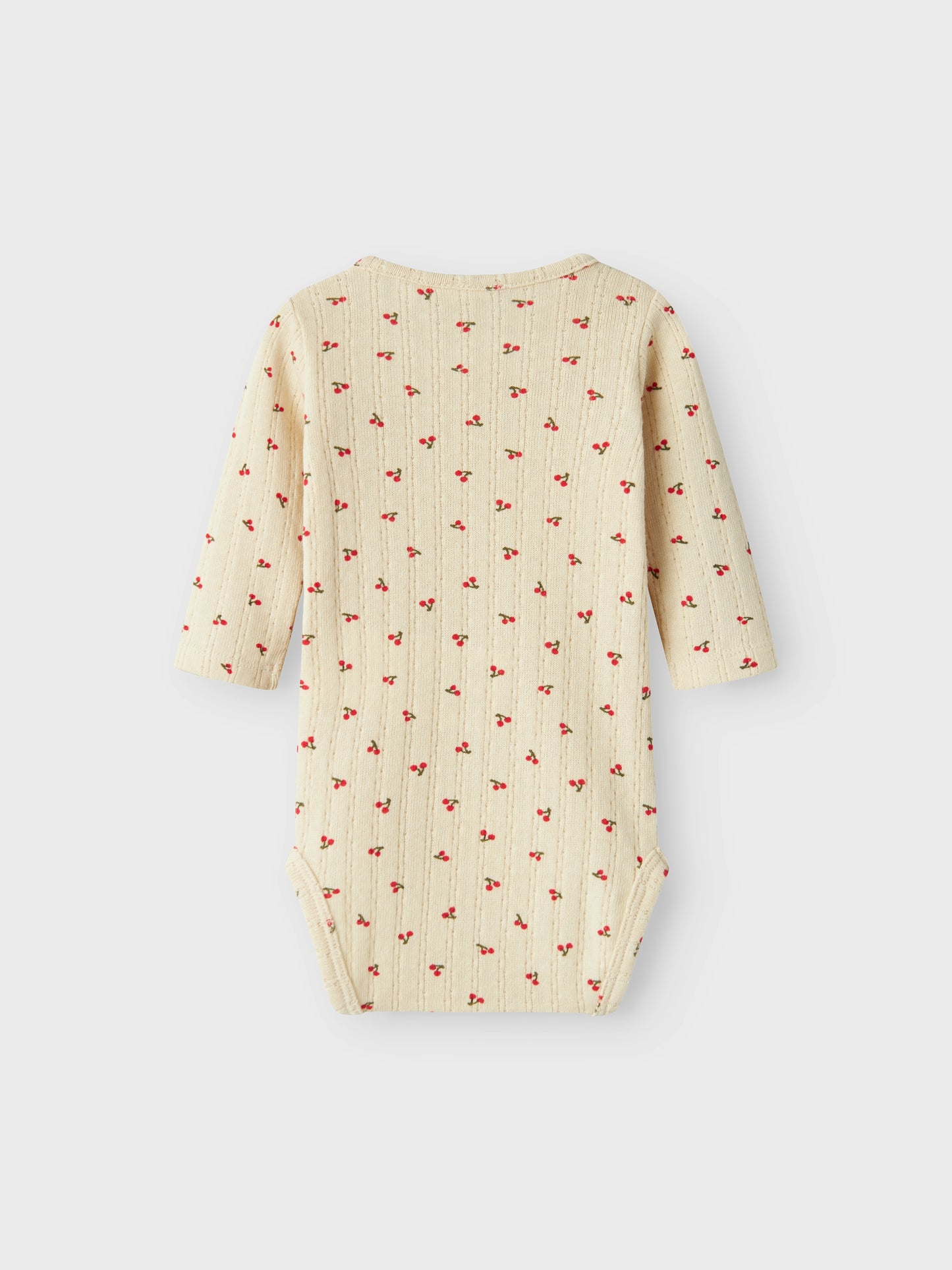 Beige långärmad baby body med mönster av små körsbär. Ekologiska baby kläder från Name it.
NBFBILIA LS BODY BOX
13237790