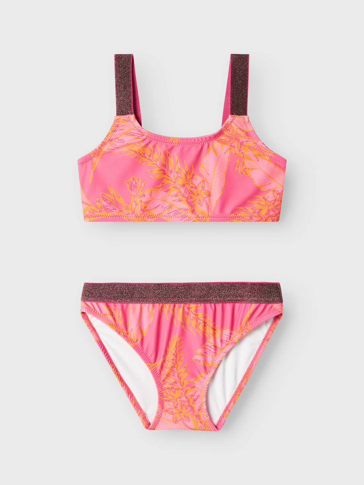 Mönstrad rosa bikini med glitter på axelbanden. Tjej badkläder. Bikini rosa och orange med blommor och blad till flicka, barn. Ta en simtur eller njut av det varma vädret i coola badklädesstilar som garanterar ditt barn en trendig look.

13226714 
NKFZERIA BIKINI