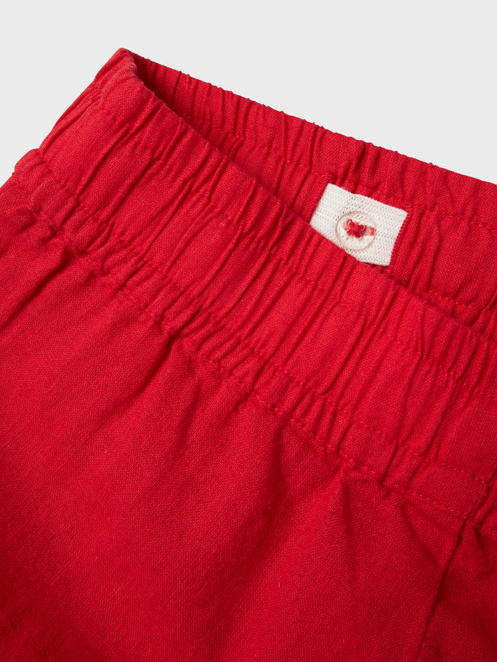 Rak, röd linnebyxa till flicka, tjej. Byxor i lin med knyte i midjan till barn och ungdom från Name it.
NKFFALINNEN STRAIGHT PANT
13240429