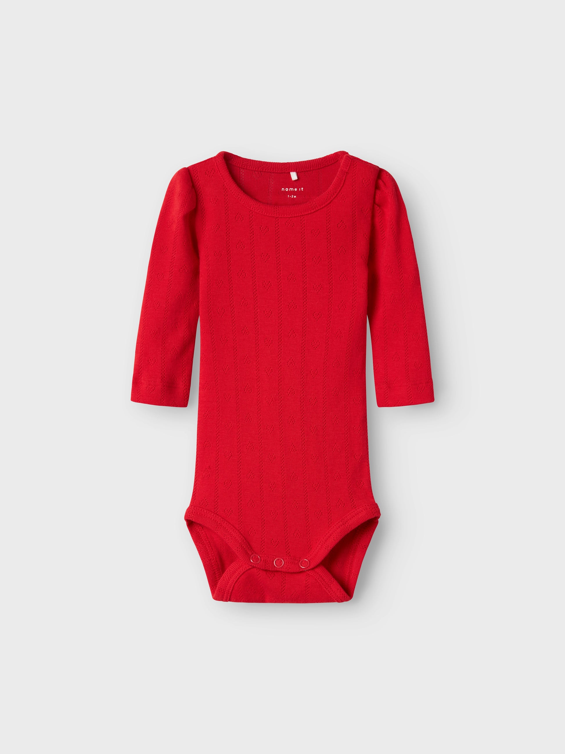 Söt röd baby body med spets och små hjärtan. Bebis bodysuit till flicka. Ekologiska babykläder från Name it.
NBFDAGNES LS BODY
13241089