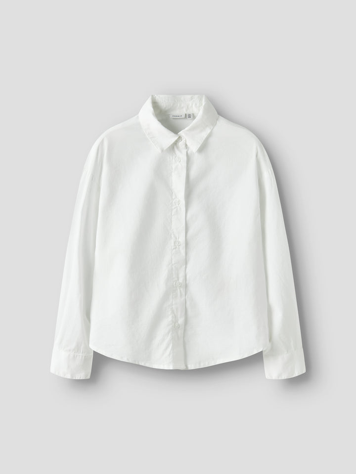 Vit tjej skjorta från Name it. Långärmad blus till flicka barn och ungdom. Klä upp ditt barn för speciella tillfällen eller vardag med coola skjortor som låter ditt barn röra sig och leka. Poplin är ett lätt, vävt tyg med slät och jämn yta för en fräsch och cool look.
NKFFEMMA
13240445