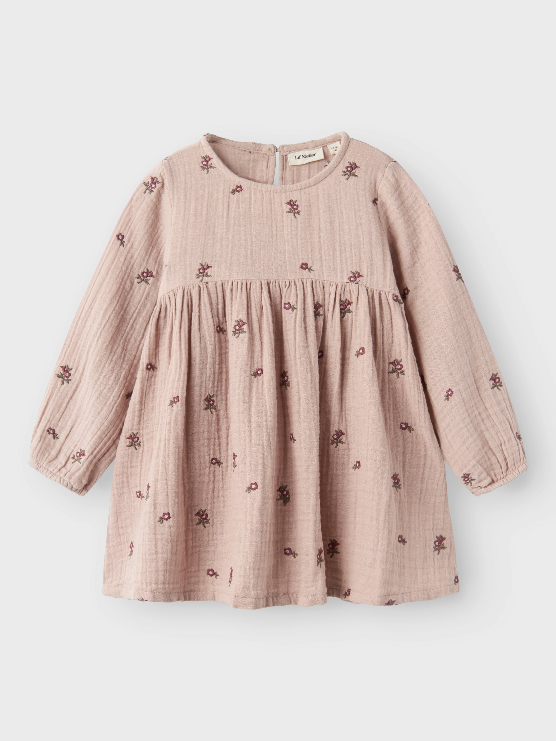 Rosa blommig långärmad klänning i ekologisk bomull till flicka.
NMFTAMINA LS LOOSE DRESS LIL
13238288