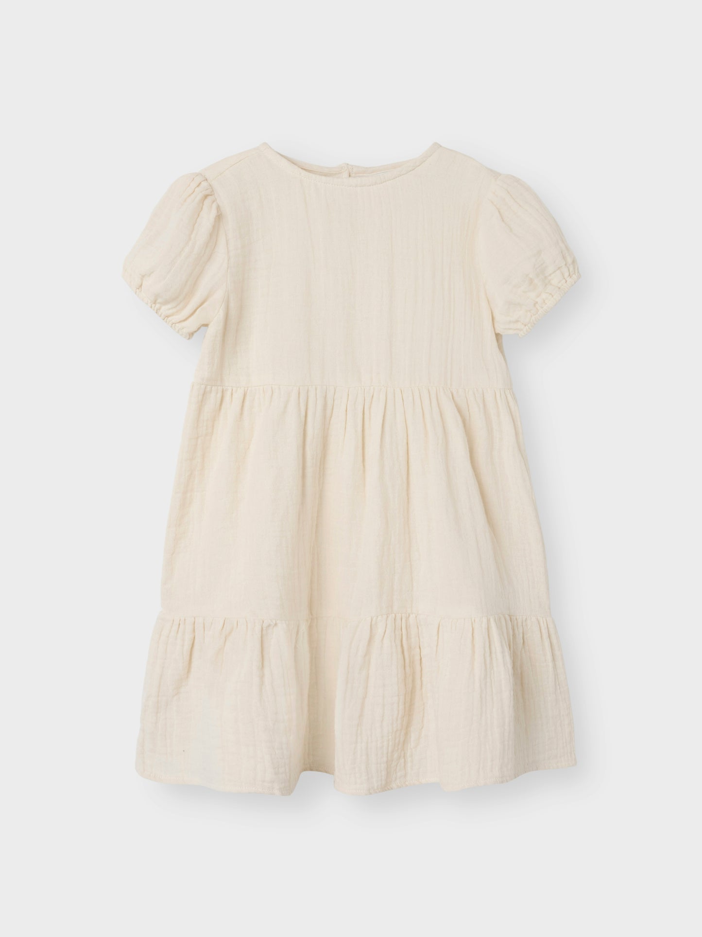 Enfärgad vit, beige barn klänning till flicka i sval och skön muslin. Söt sommar klänning till vardag och fest, midsommar och bröllop.
NMFJASMIN SS DRESS NOOS
13240414