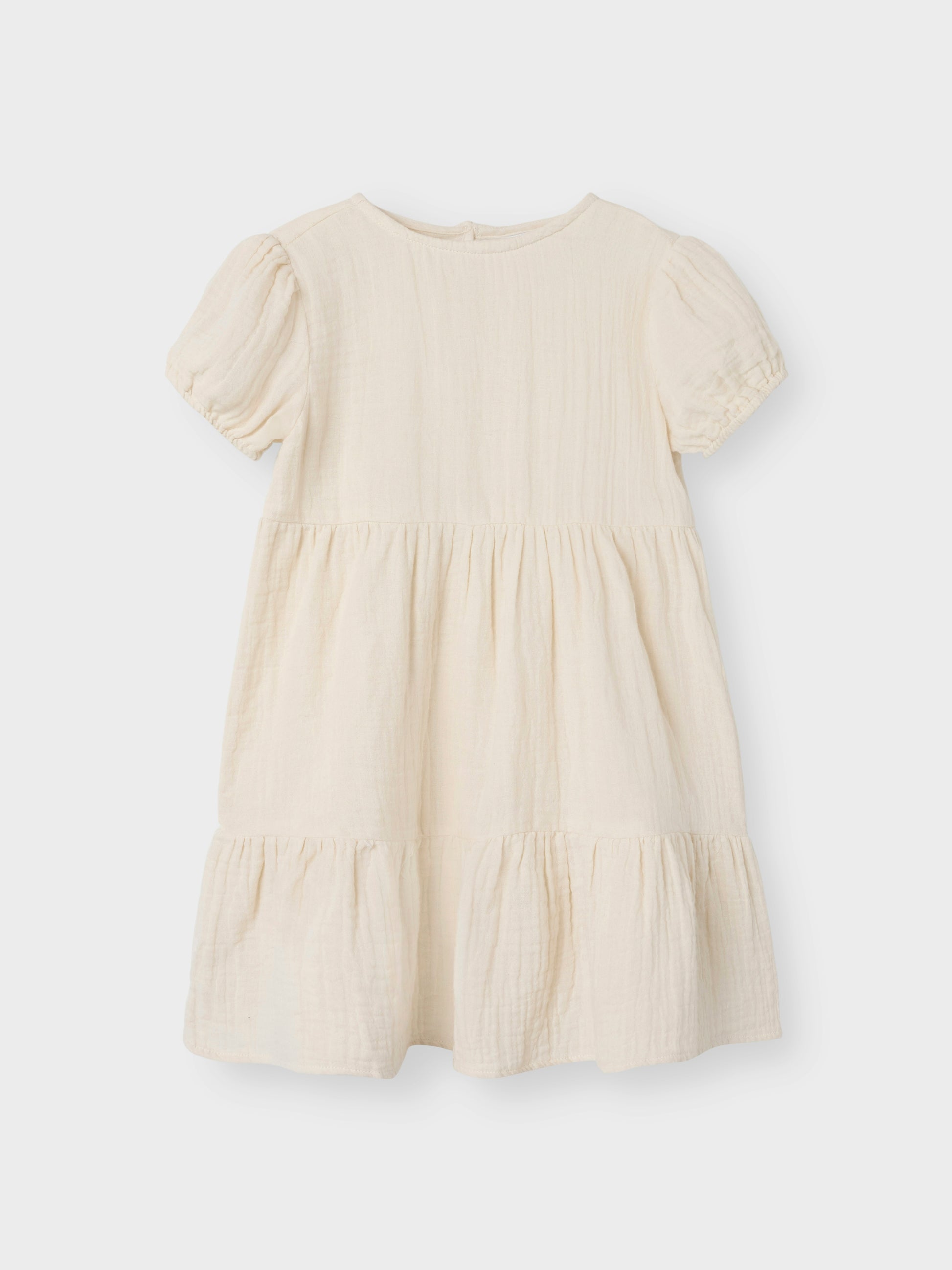 Enfärgad vit, beige barn klänning till flicka i sval och skön muslin. Söt sommar klänning till vardag och fest, midsommar och bröllop.
NMFJASMIN SS DRESS NOOS
13240414