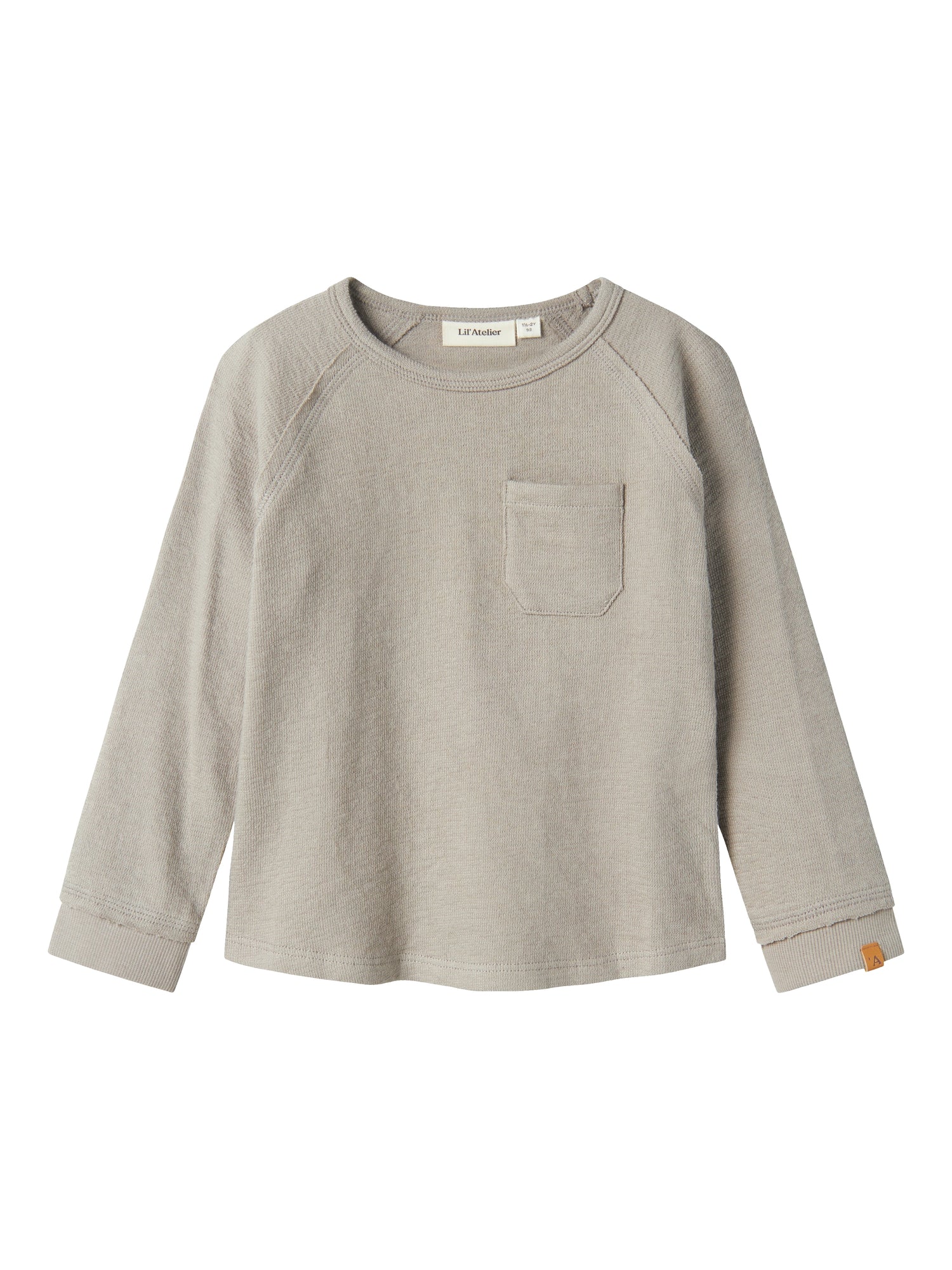 Sweat tröja grå i ekologisk bomull till pojke och flicka. Tröja med raglanärm från Lil 'Atelier
NMMDIAS LS TOP LIL
13228100