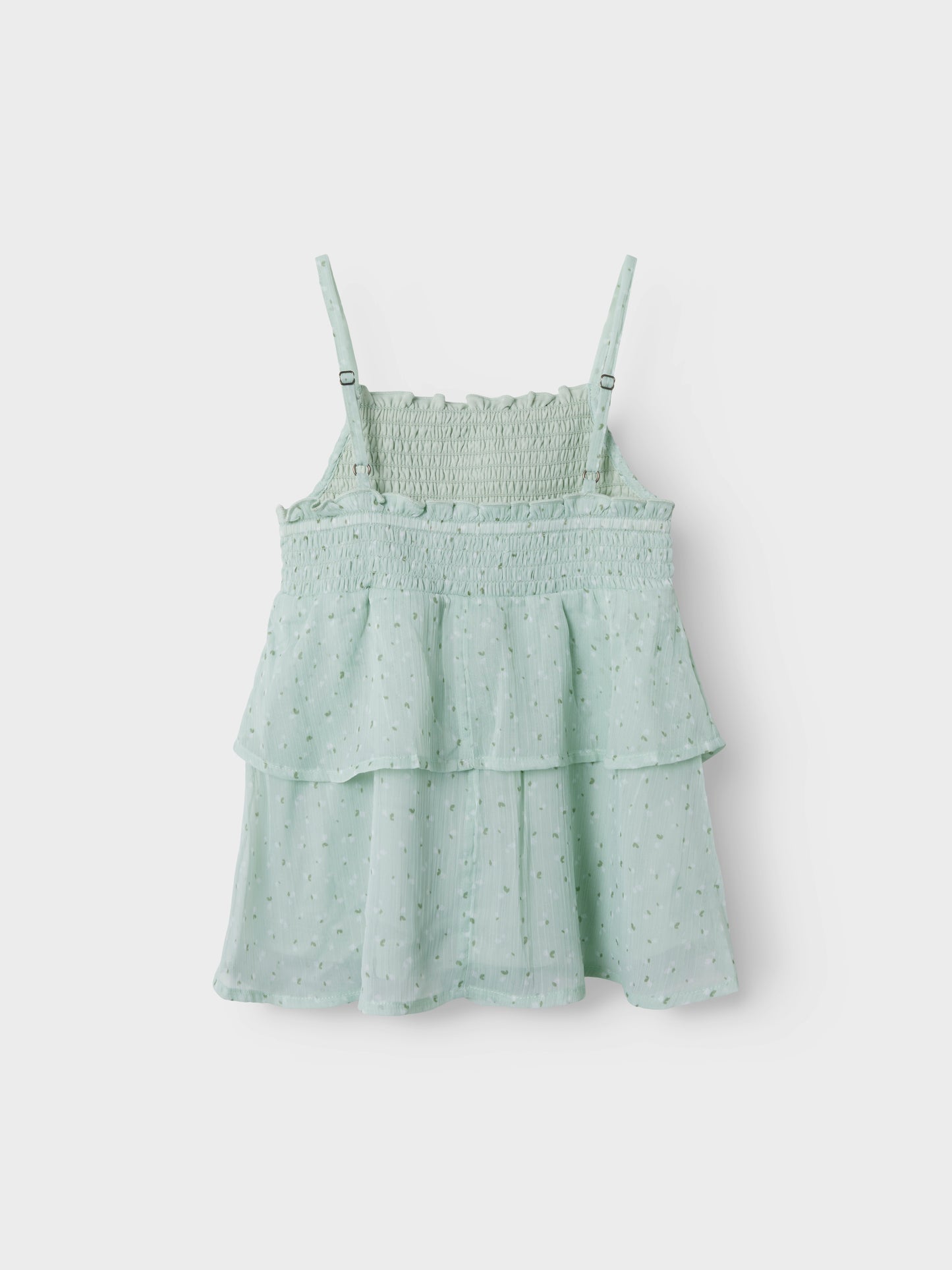 Grönt linne med smala axelband till tjej. Volanger linne till flicka perfekt för stunder att vara finklädd, midsommar, skolavslutningskläder och examen från Name it.
NKFFEDOLINA STRAP TOP
13246660