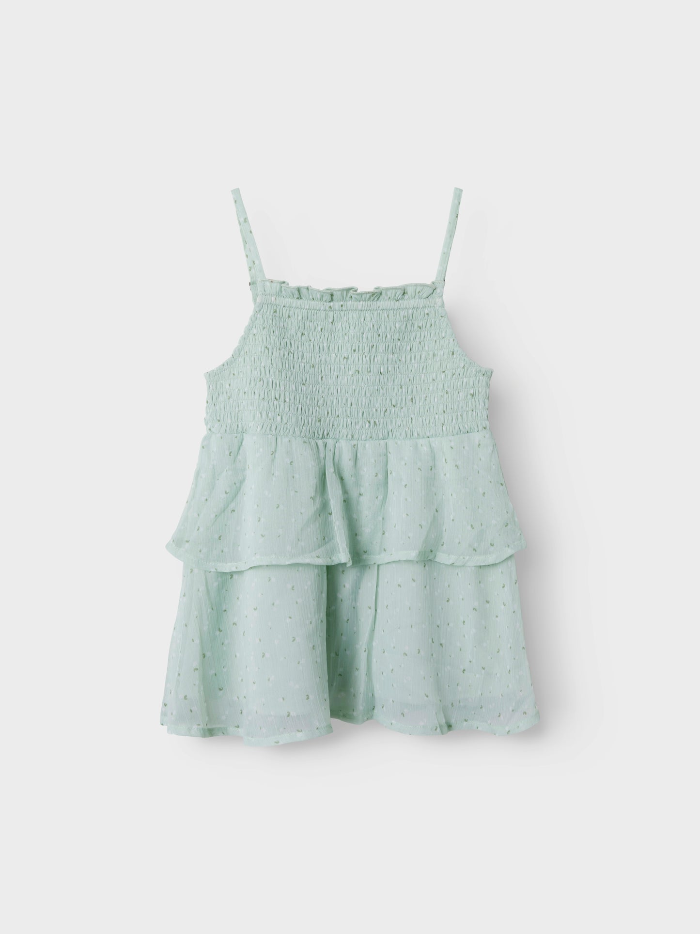 Grönt linne med smala axelband till tjej. Volanger linne till flicka perfekt för stunder att vara finklädd, midsommar, skolavslutningskläder och examen från Name it.
NKFFEDOLINA STRAP TOP
13246660