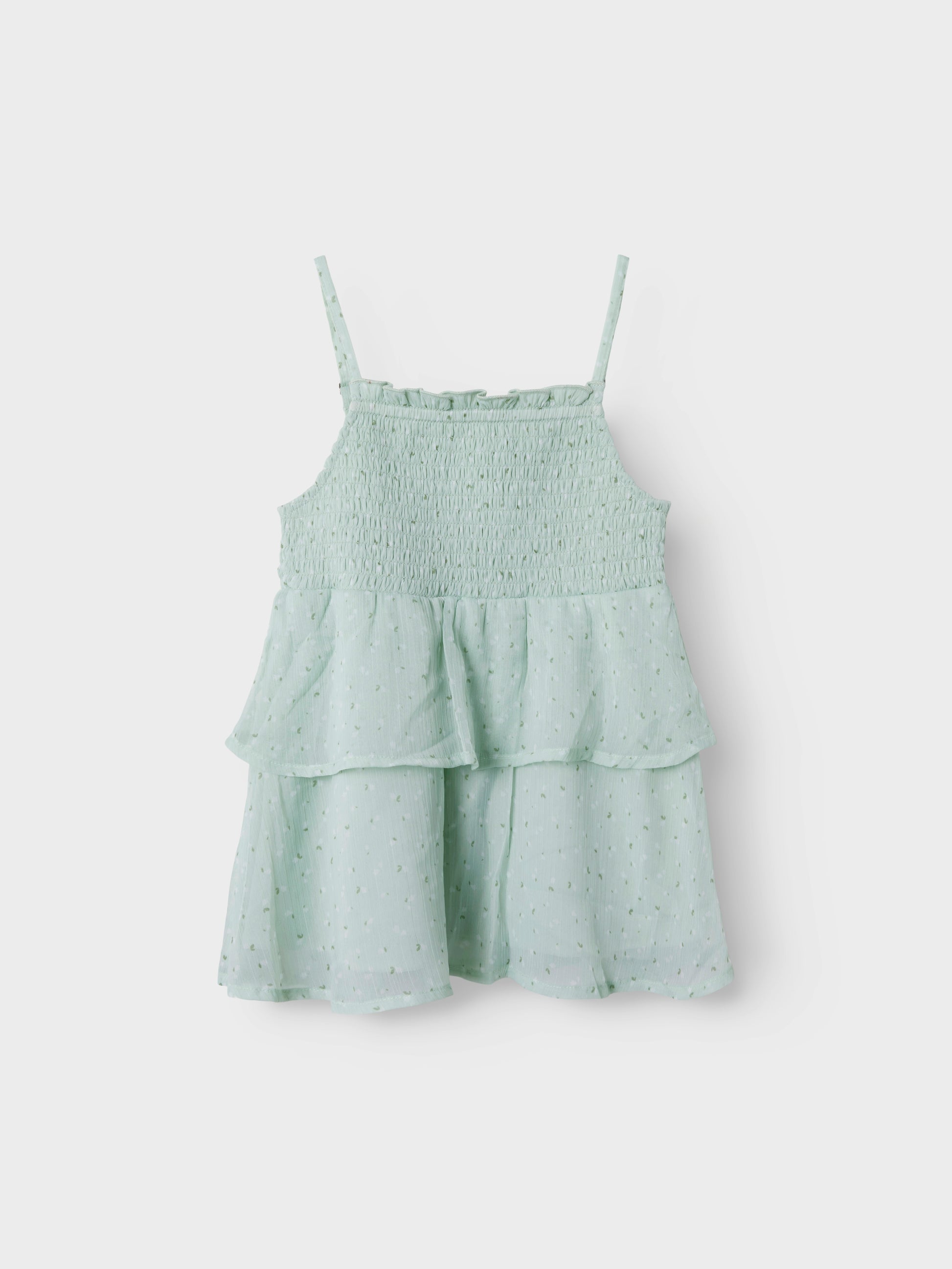 Grönt linne med smala axelband till tjej. Volanger linne till flicka perfekt för stunder att vara finklädd, midsommar, skolavslutningskläder och examen från Name it.
NKFFEDOLINA STRAP TOP
13246660