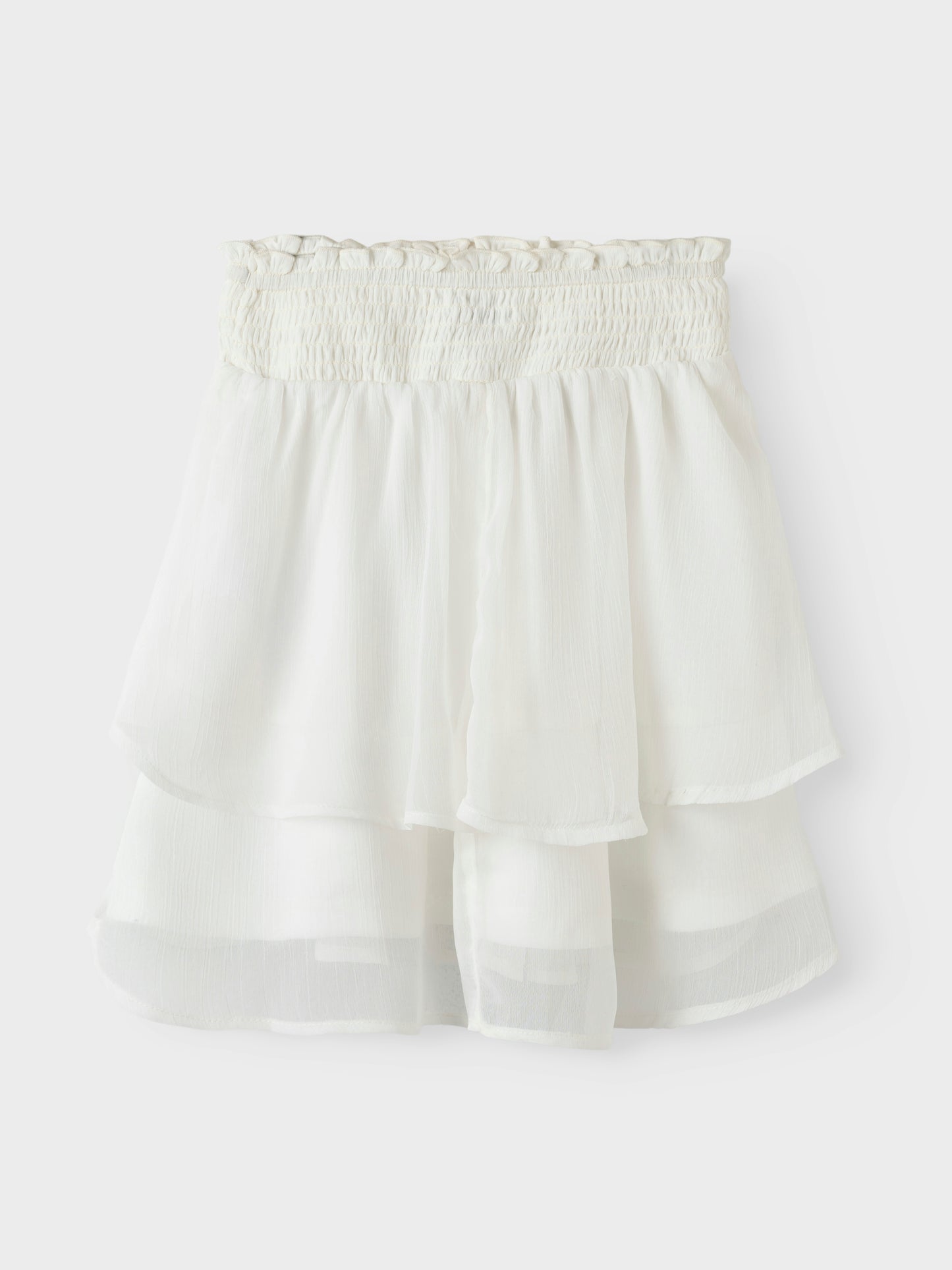 Vit vacker volang kjol till flicka, tjej, barn och ungdom. Midsommar kjol och skolavslutning, examenskläder. Fira festliga tillfällen eller vardag med trendiga kjolar som ger dig frihet att röra dig och leka. Chiffong är ett lätt vävt tyg med en genomskinlig effekt och en blank yta för en elegant look.

NKFFEDOLINA SKIRT
13246661