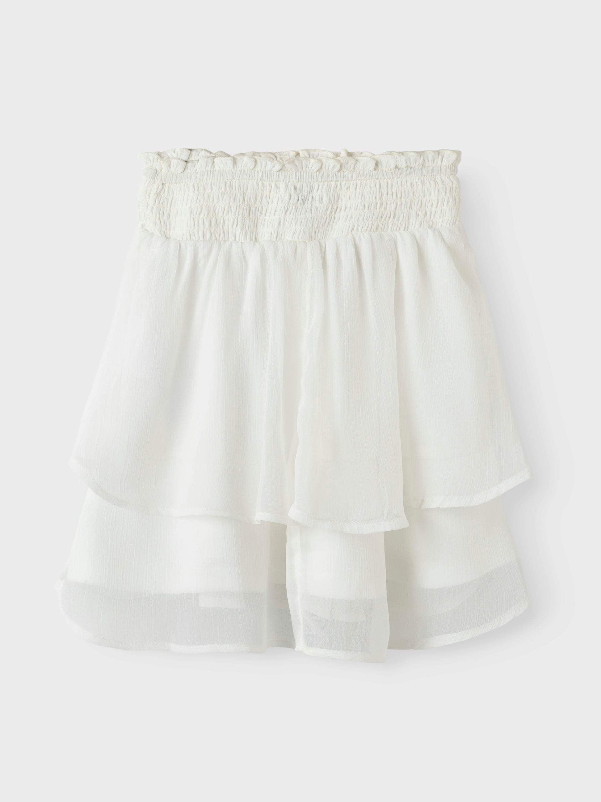 Vit vacker volang kjol till flicka, tjej, barn och ungdom. Midsommar kjol och skolavslutning, examenskläder. Fira festliga tillfällen eller vardag med trendiga kjolar som ger dig frihet att röra dig och leka. Chiffong är ett lätt vävt tyg med en genomskinlig effekt och en blank yta för en elegant look.

NKFFEDOLINA SKIRT
13246661