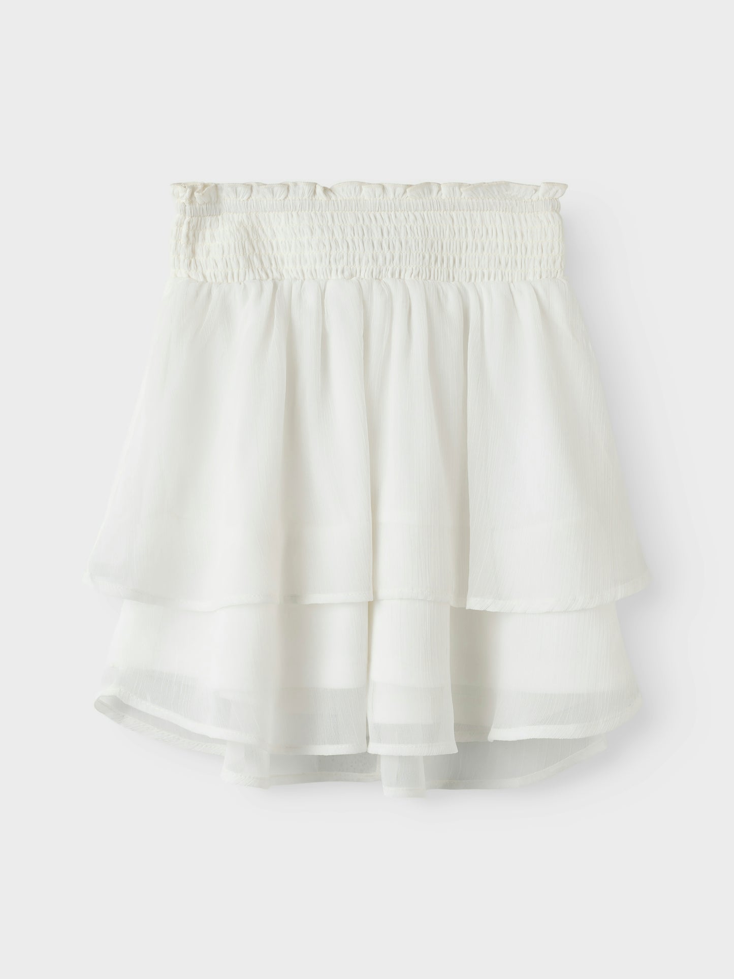 Vit vacker volang kjol till flicka, tjej, barn och ungdom. Midsommar kjol och skolavslutning, examenskläder. Fira festliga tillfällen eller vardag med trendiga kjolar som ger dig frihet att röra dig och leka. Chiffong är ett lätt vävt tyg med en genomskinlig effekt och en blank yta för en elegant look.

NKFFEDOLINA SKIRT
13246661