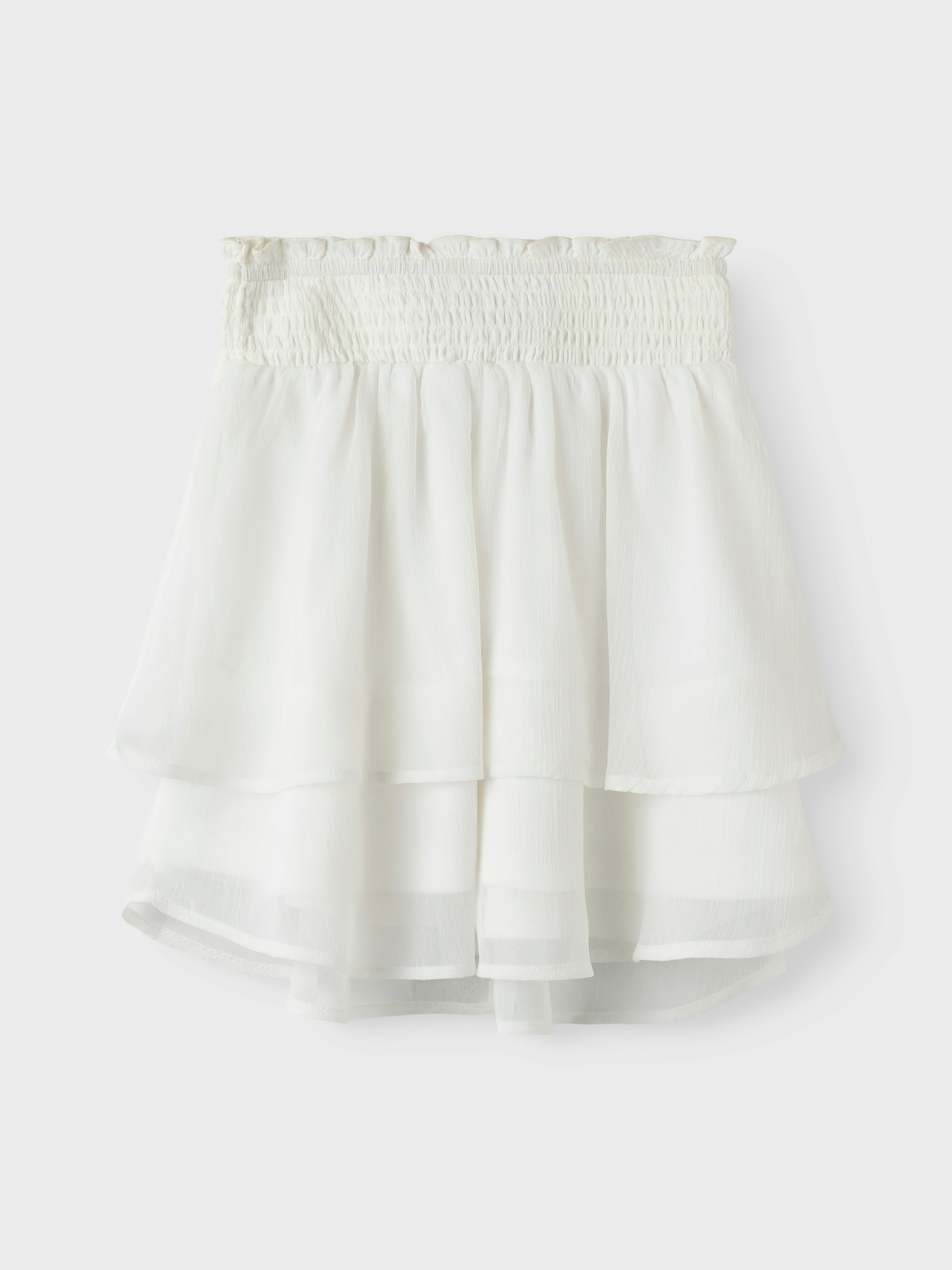 Vit vacker volang kjol till flicka, tjej, barn och ungdom. Midsommar kjol och skolavslutning, examenskläder. Fira festliga tillfällen eller vardag med trendiga kjolar som ger dig frihet att röra dig och leka. Chiffong är ett lätt vävt tyg med en genomskinlig effekt och en blank yta för en elegant look.

NKFFEDOLINA SKIRT
13246661