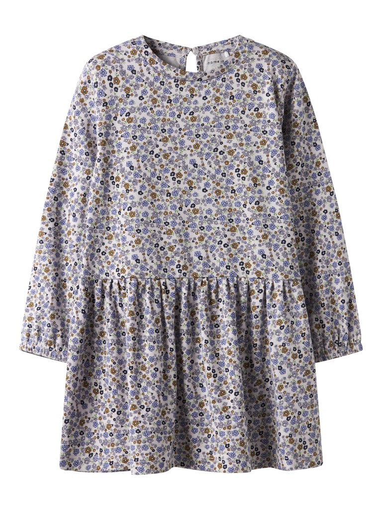 Småblommig klänning med lång ärm till flicka. Ekologiska barnkläder från Name it. Blå och lila blom mönstrad långärmad klänning.
NMFTULINE LS DRESS
13251758