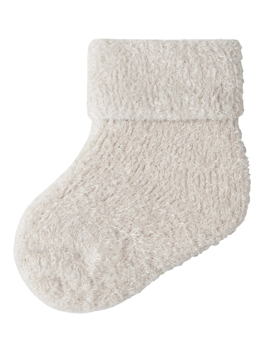 Mjuk, mysig vit, grå baby strumpor till flicka och pojke. Bebis strumpa, neutral färg till nyfödd.
NBFOLLI TERRY FLUFFY SOCK
13207470