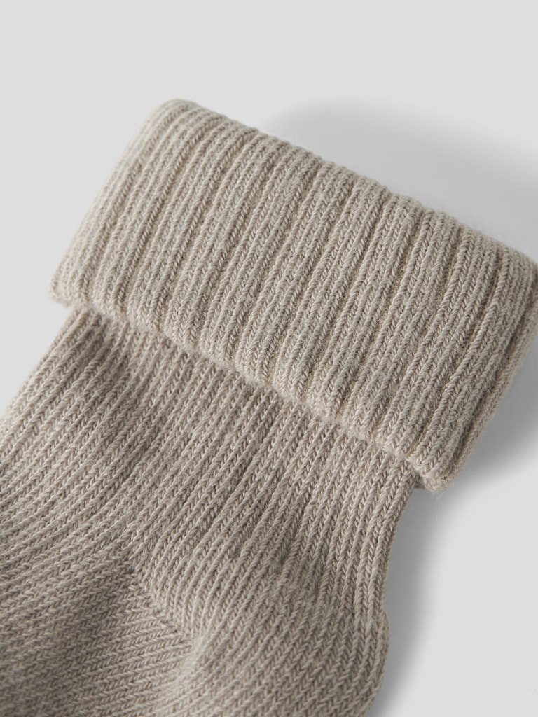 Beige baby strumpa till pojke och flicka. Bebis strumpor till nyfödd. Strumpor som sitter kvar.
NBMNOBBU SOCK
13207468