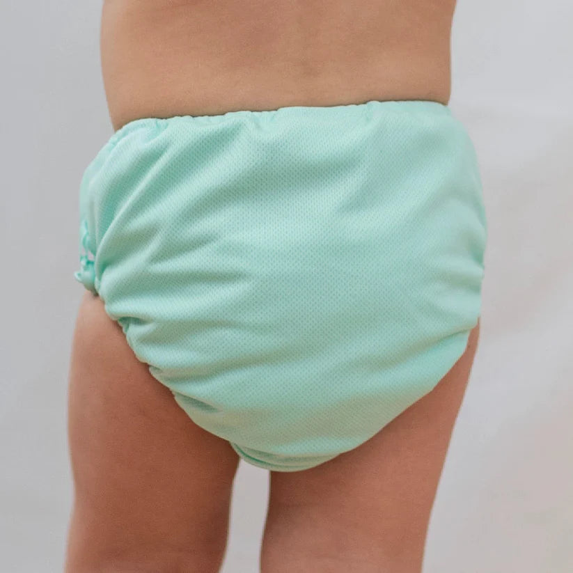 Mint grön blöj bad byxa till bebis pojke och flicka. Badbyxor till babysim blöjbadbyxa från Geggamoja.