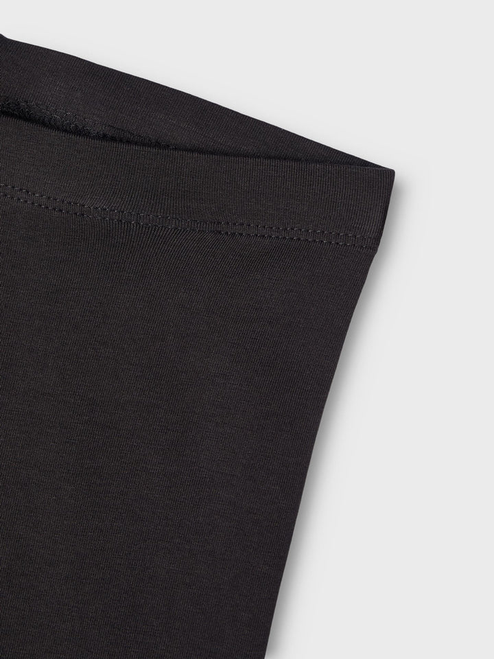 Name It svarta leggings för flicka i ekologisk bomull med elastisk midja och mjuk stretchkvalitet