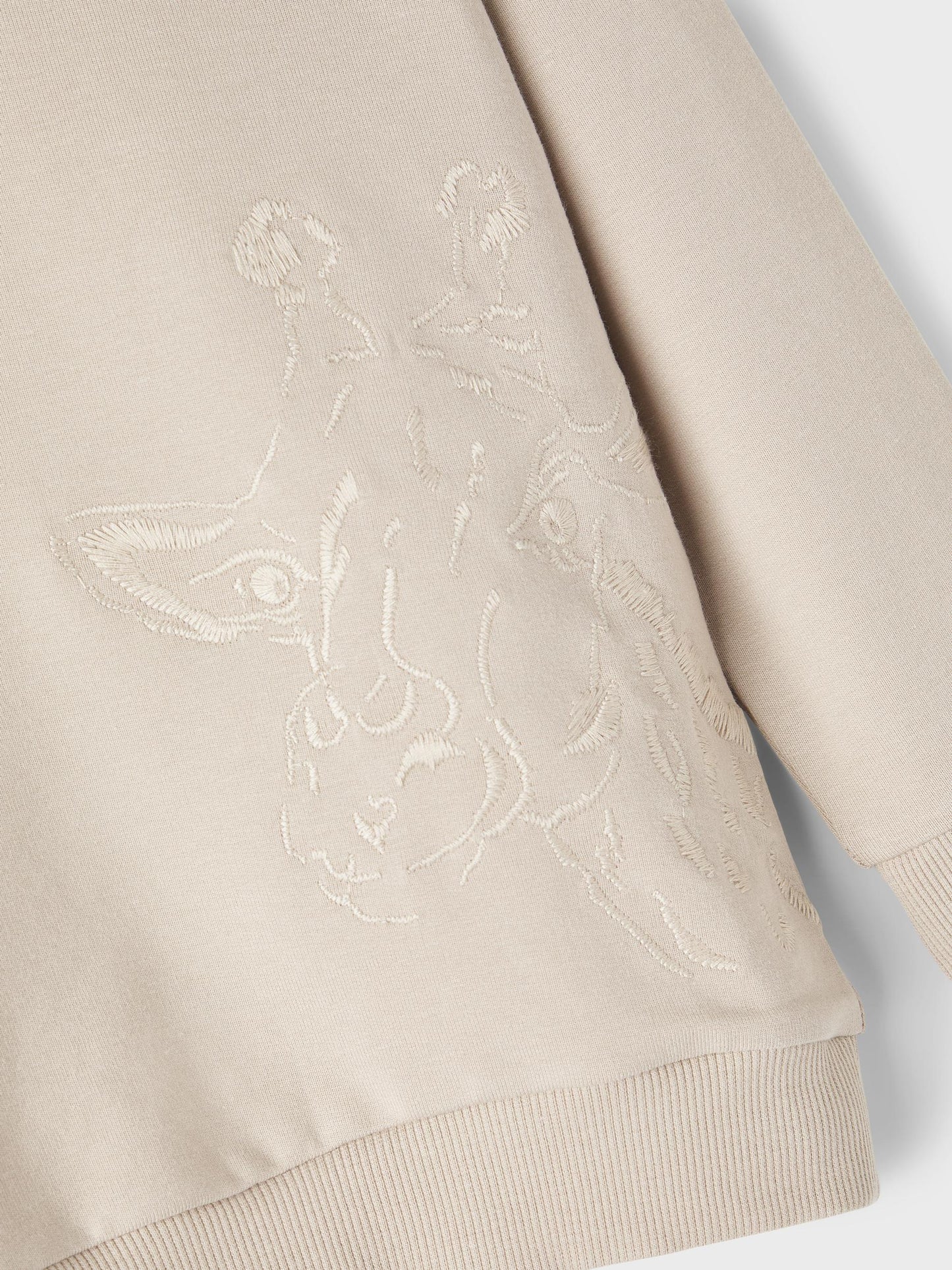 Beige tröja med giraff